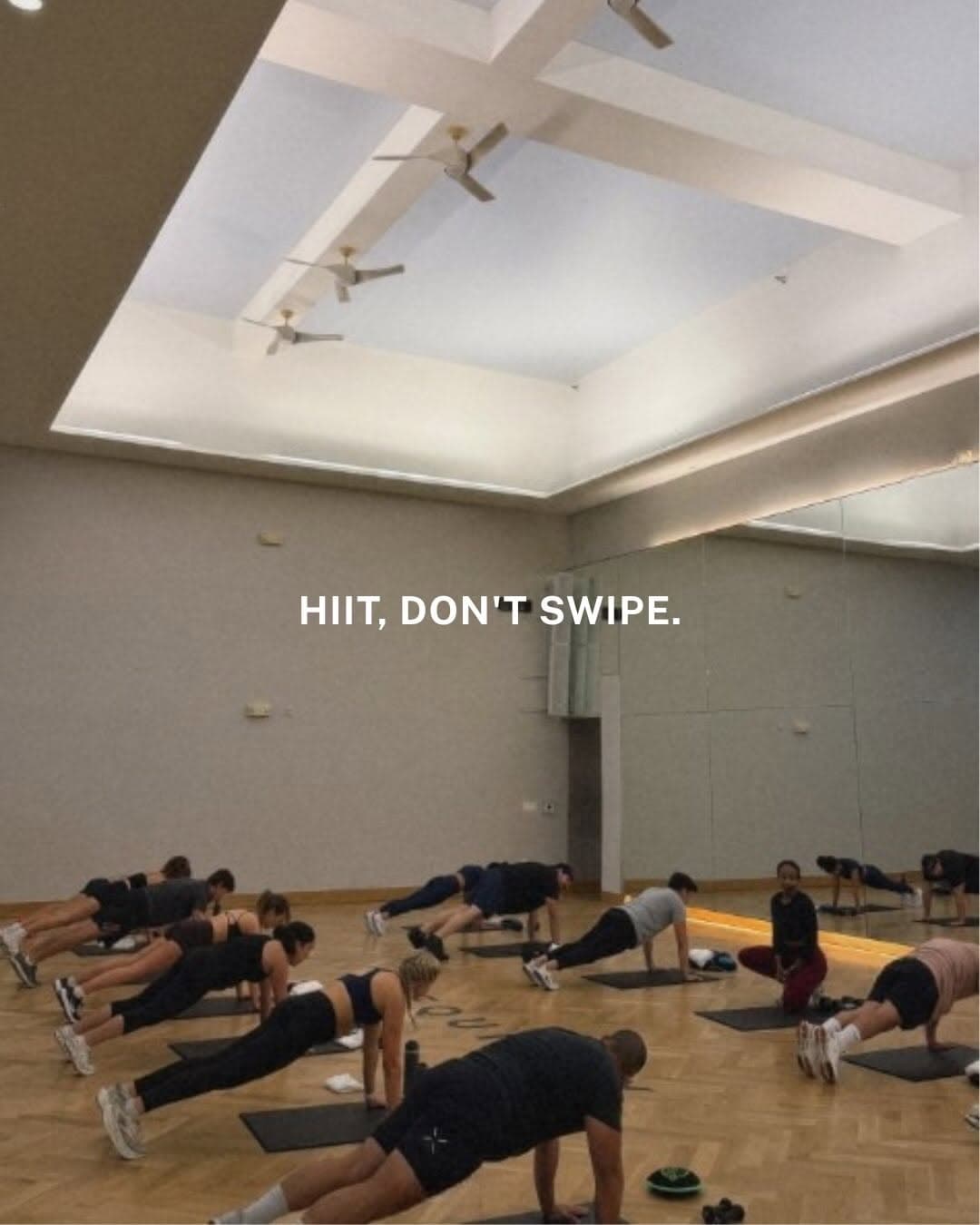 Singles participating in a HIIT workout class at Equinox, organized by SOSO Club