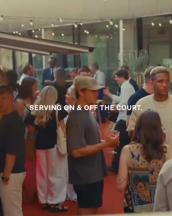 Padel court set up with dining tables and chairs for a supper club event hosted by Padel Social Club